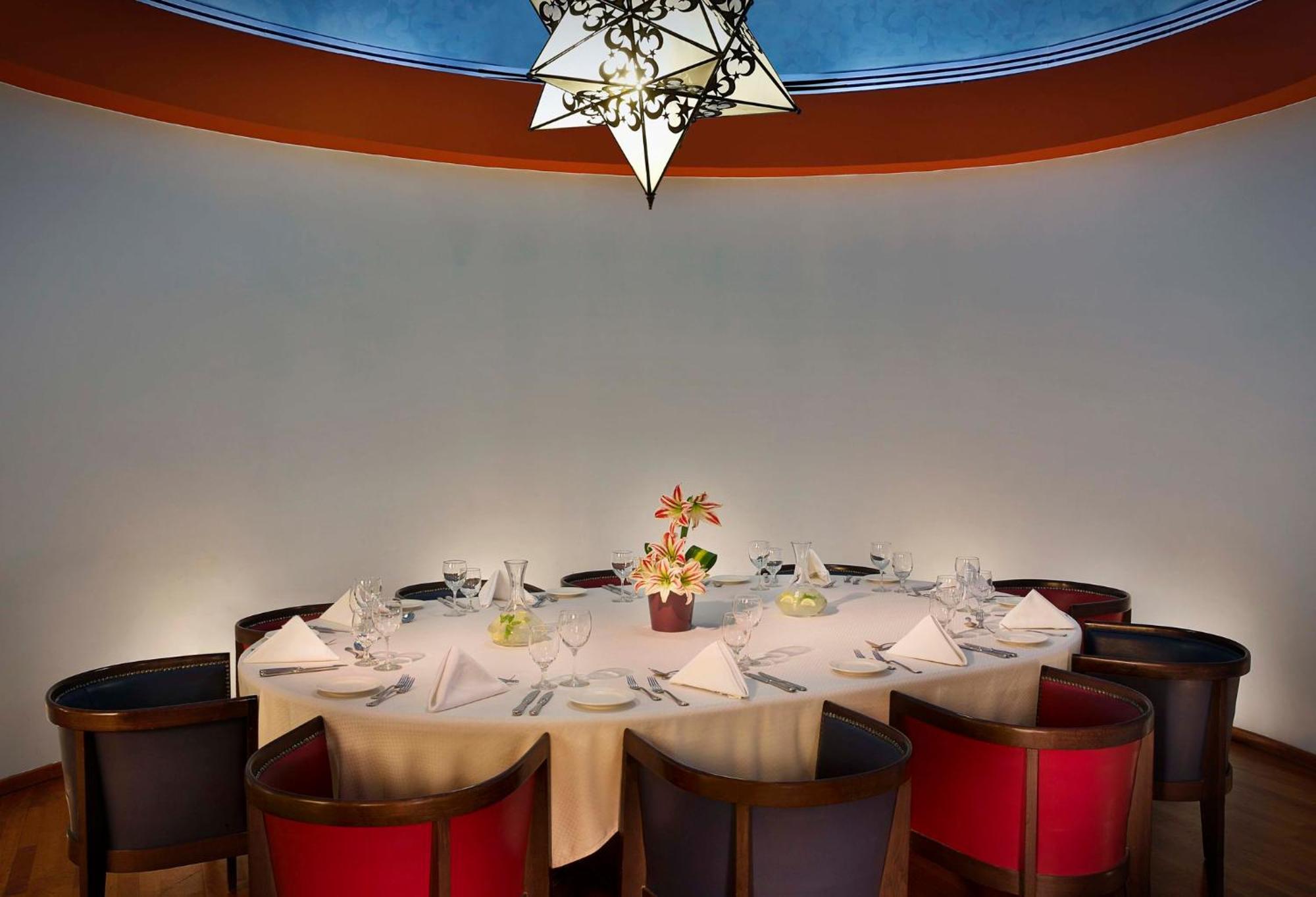 Crowne Plaza Amman By Ihg Hotel Exterior photo The restaurant's interior