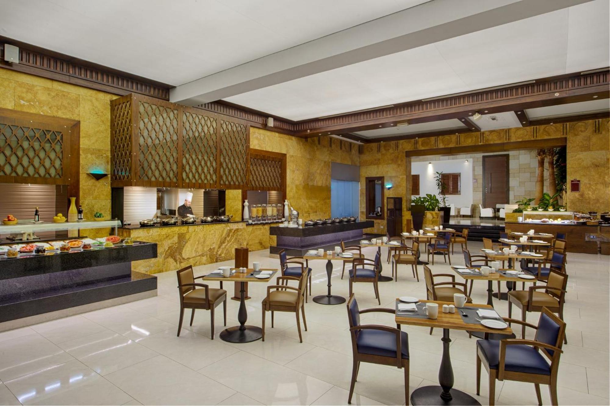 Crowne Plaza Amman By Ihg Hotel Exterior photo The restaurant